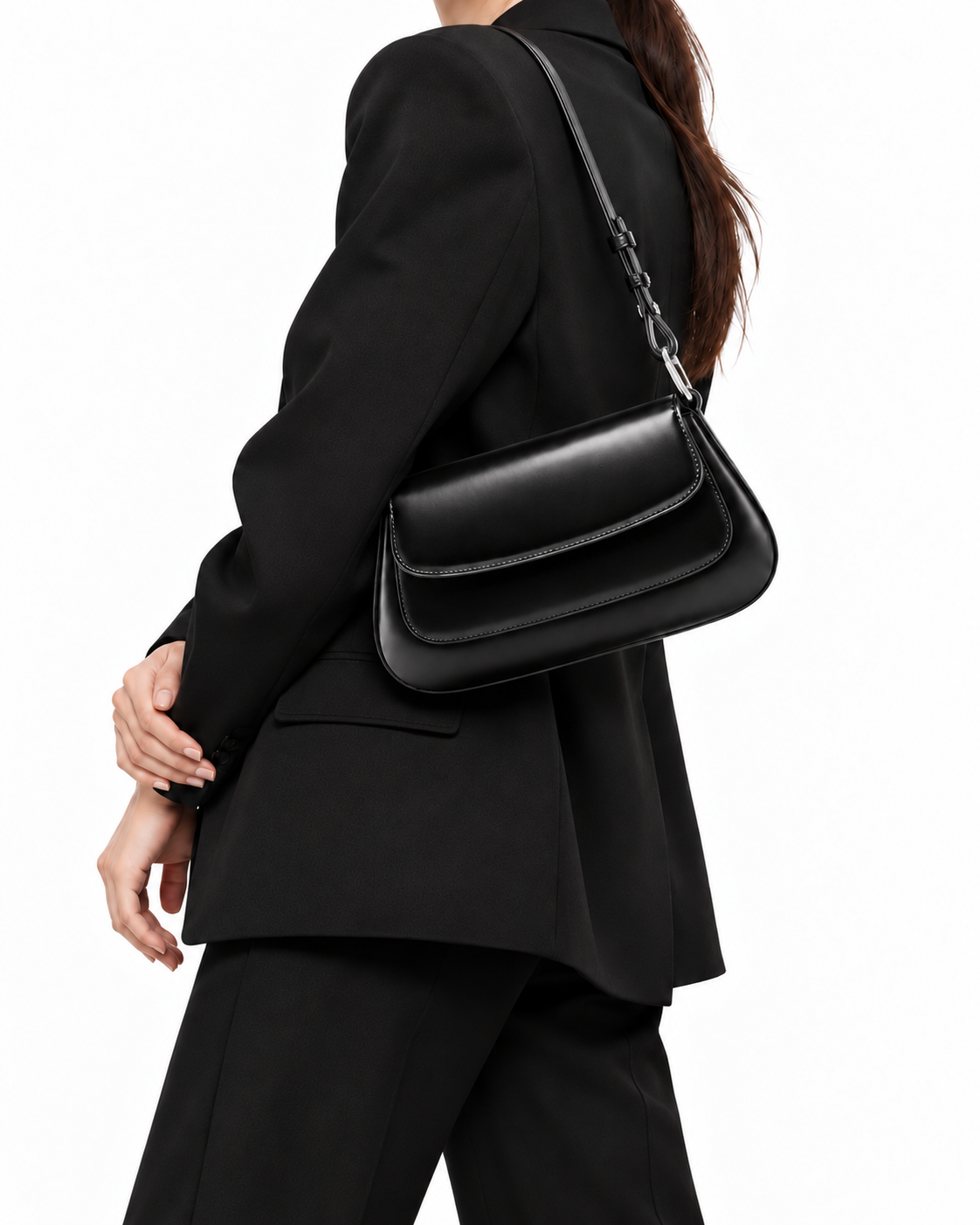The Marcella Shoulder Bag in Nero, worn with a black outfit
