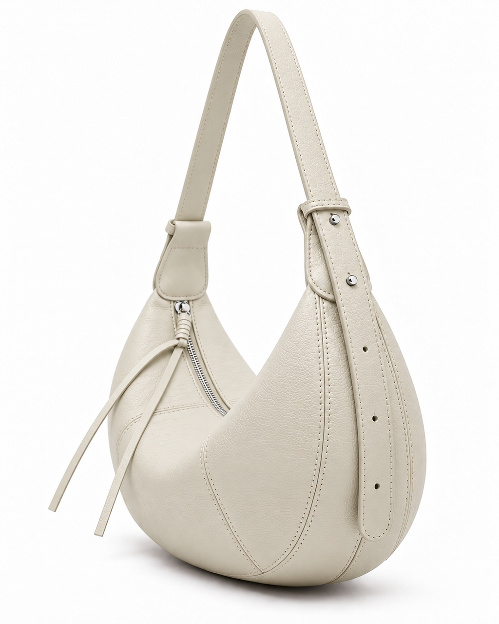 The Flavia Crescent Bag in Ivory, three-quarter view